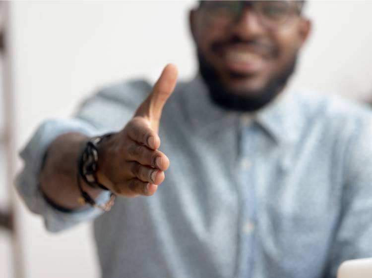 Man extending handshake
